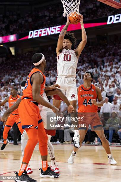 Jaylin Williams of the Arkansas Razorbacks rebounds the basketball during a game against the Auburn Tigers at Bud Walton Arena on February 08, 2022...