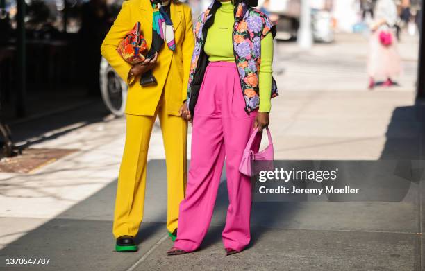 Monica Awe-Etuk and Nuni Yusuf are seen outside Bronx and Banco during New York Fashion Week on February 11, 2022 in New York City.