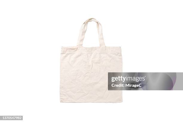 eco-friendly reusable linen shopping bag on white - einkaufstüten stock-fotos und bilder
