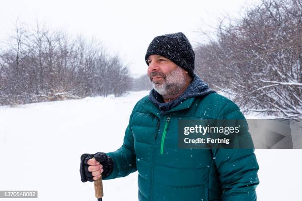 hiking on a snowy day - winter sport walk old stock pictures, royalty-free photos & images