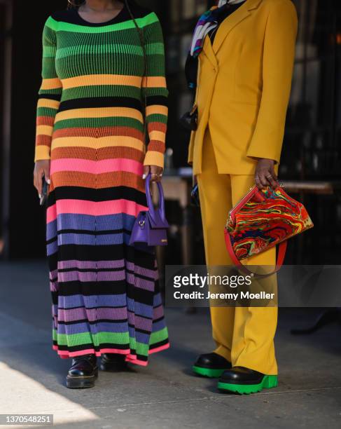 Monica Awe-Etuk and Shannae Ingleton Smith are seen outside Bronx and Banco during New York Fashion Week on February 11, 2022 in New York City.