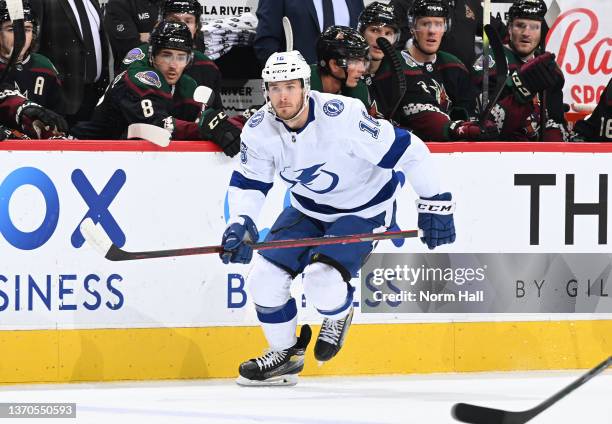 Taylor Raddysh of the Tampa Bay Lightning skates up ice against the Arizona Coyotes at Gila River Arena on February 11, 2022 in Glendale, Arizona.