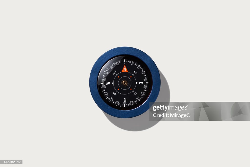 Navigational Compass on Beige Background