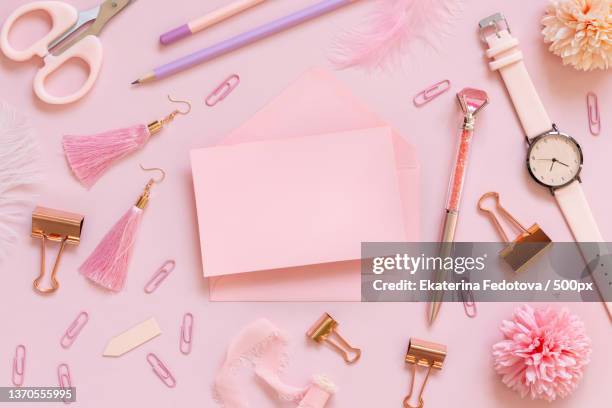 pink card near school stationery on pink - earring card stock pictures, royalty-free photos & images