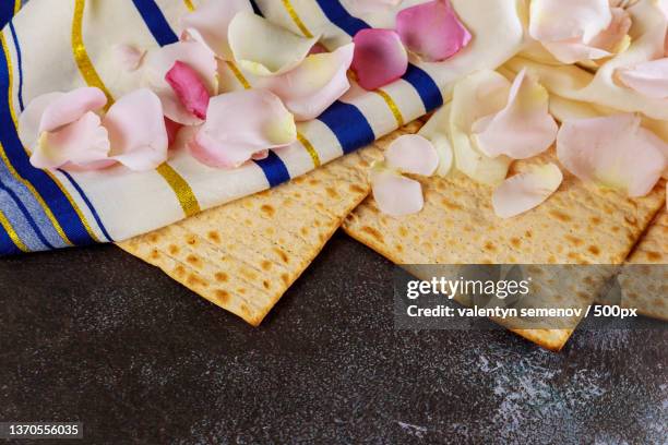 passover matzoh jewish holiday bread,kosher wine over wooden table - pesach seder stock pictures, royalty-free photos & images