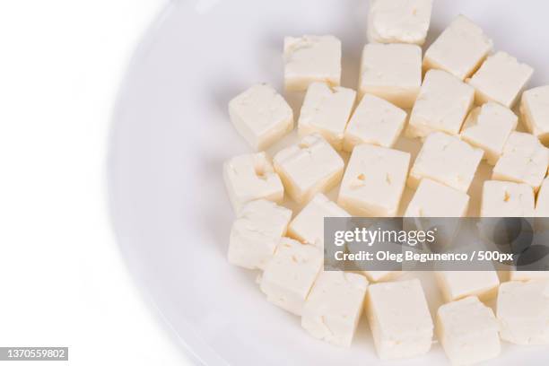 tasty soft cheese closeup,close-up of sugar cubes in plate,moldova - cheese cubes stock pictures, royalty-free photos & images