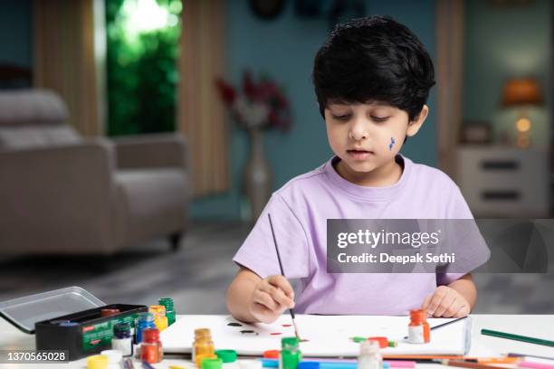Boy Using Paper 936 Paper Boy Drawing Stock Photos, High-Res Pictures, and Images ...