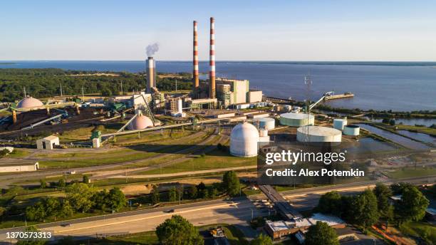 big thermal power plant near newburg, maryland, on the shore of potomac river. - maryland us state stock pictures, royalty-free photos & images