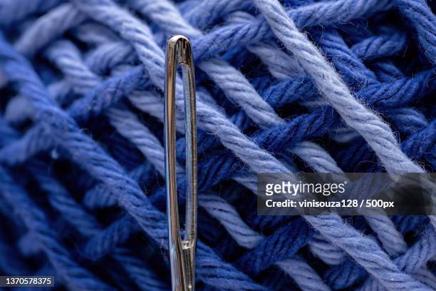 tapestry metal needle,close-up of blue rope - タペストリー ストックフォトと画像