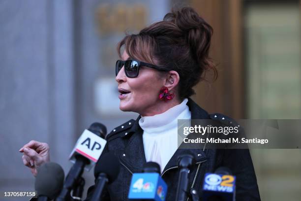 Former Alaska Governor Sarah Palin speaks with reporters as she leaves federal court on February 14, 2022 in New York City. On Monday U.S. District...