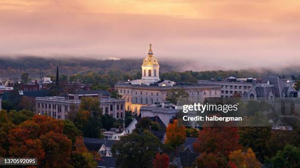 low aerial shot of new hampshire state house on foggy morning - new hampshire stock pictures, royalty-free photos & images