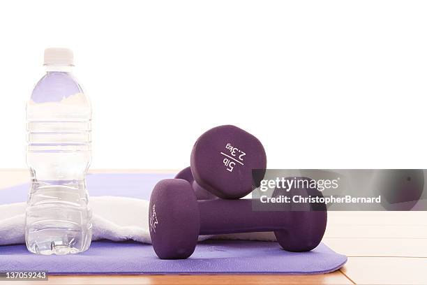 purple dumbbell - water bottle on white stock pictures, royalty-free photos & images