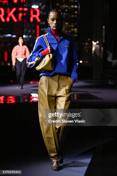 Model walks the runway during Tory Burch Fall/Winter 2022 New York Fashion Week on February 14, 2022 in New York City.