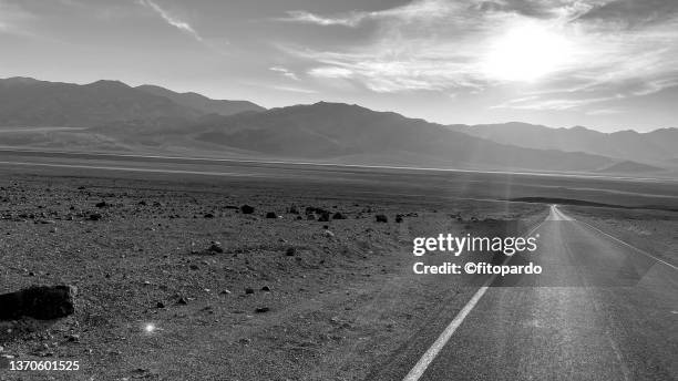 coming out of artist drive in death valley national park - death valley road bildbanksfoton och bilder