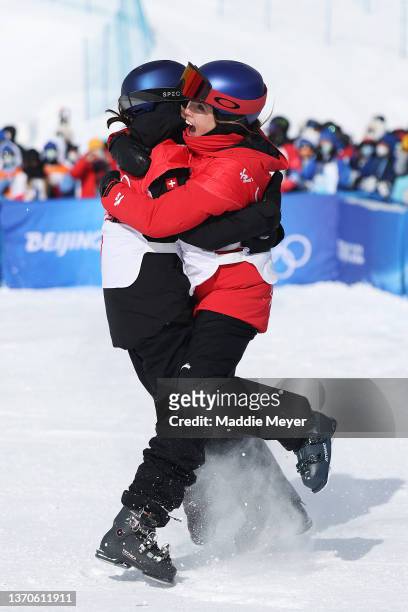 Gold medallist Mathilde Gremaud of Team Switzerland and Silver medallist Ailing Eileen Gu of Team China react after winning their medals during the...