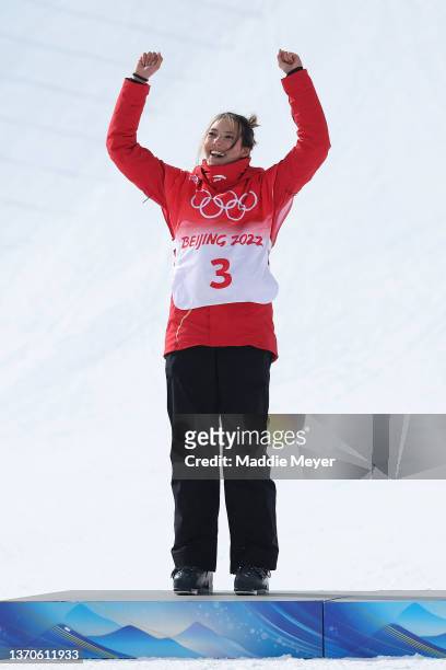 Silver medallist Ailing Eileen Gu of Team China celebrates during the Women's Freestyle Skiing Freeski Slopestyle Final flower ceremony on Day 11 of...
