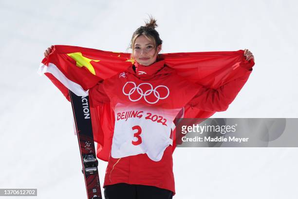 Silver medallist Ailing Eileen Gu of Team China celebrates during the Women's Freestyle Skiing Freeski Slopestyle Final flower ceremony on Day 11 of...