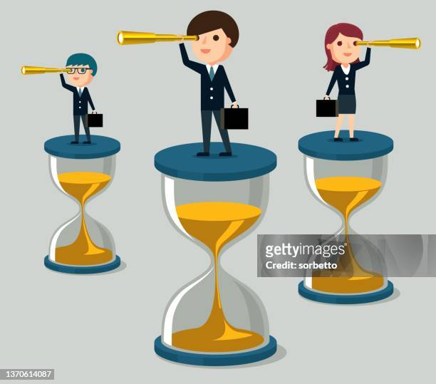 business people standing on hourglass - findlater stock illustrations