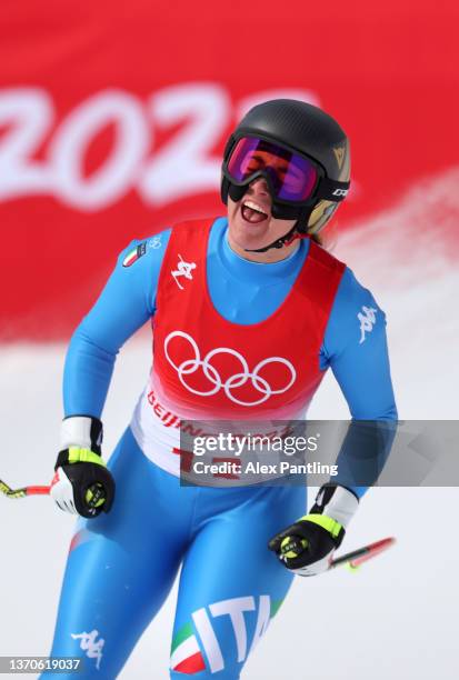 Sofia Goggia of Team Italy reacts following her run during the Women's Downhill on day 11 of the Beijing 2022 Winter Olympic Games at National Alpine...