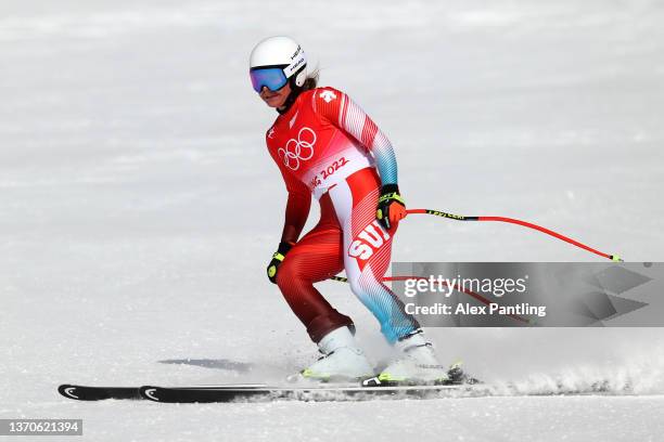 Corinne Suter of Team Switzerland reacts following her run during the Women's Downhill on day 11 of the Beijing 2022 Winter Olympic Games at National...
