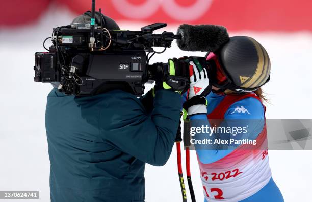 Sofia Goggia of Team Italy kisses the camera following her run during the Women's Downhill on day 11 of the Beijing 2022 Winter Olympic Games at...