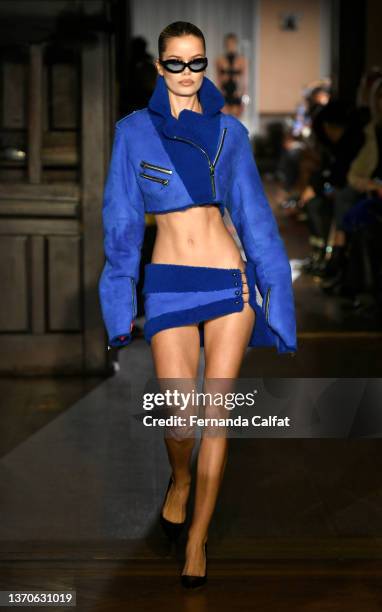 Model walks the runway during LaQuan Smith - February 2022 New York Fashion Week at 60 Pine Street on February 14, 2022 in New York City.