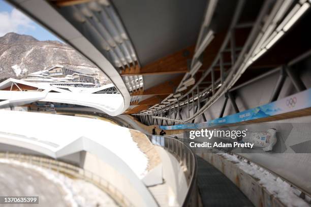 Kaillie Humphries of Team United States slides during the 2-woman Bobsleigh Heats on day 11 of Beijing 2022 Winter Olympic Games at National Sliding...