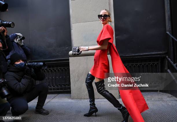 Leonie Hanne is seen wearing a Carolina Herrera with black boots outfit outside the Carolina Herrera show during New York Fashion Week A/W 2022 on...