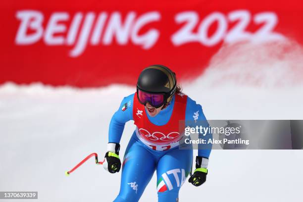 Sofia Goggia of Team Italy reacts following her run during the Women's Downhill on day 11 of the Beijing 2022 Winter Olympic Games at National Alpine...