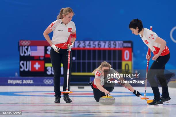 Melanie Barbezat, Alina Paetz and Esther Neuenschwander of Team Switzerland compete against Team United States during the Women’s Curling Round Robin...