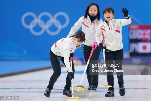 Yurika Yoshida, Satsuki Fujisawa and Yumi Suzuki of Team Japan compete against Team Great Britain during the Women’s Curling Round Robin Session on...