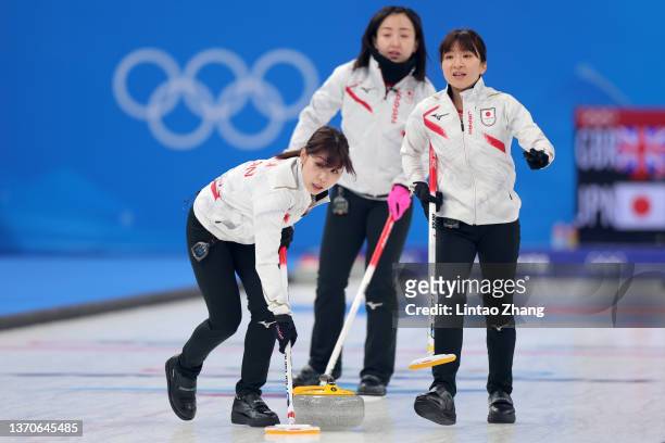 Yurika Yoshida, Satsuki Fujisawa and Yumi Suzuki of Team Japan compete against Team Great Britain during the Women’s Curling Round Robin Session on...