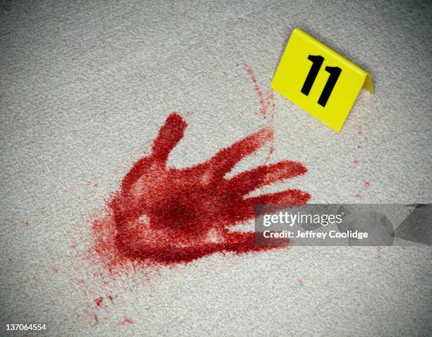 bloody handprint and evidence marker - beweismittel stock-fotos und bilder