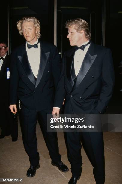 American actor Jake Busey and his father, American actor Gary Busey, both wearing tuxedos and bow ties, attend the 10th Annual American Cinema...