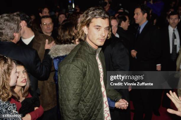 British singer, songwriter and guitarist Gavin Rossdale, wearing a green quilted jacket, attends the Hollywood premiere of 'Scream 2,' held at Mann's...