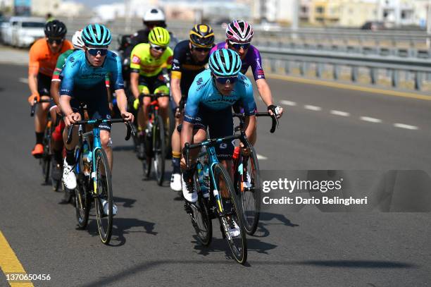 Alexandre Vinokourov of Kazahkstan and Harold Martin Lopez Granizo of Ecuador and Astana Qazaqstan Development Team compete in the breakaway during...