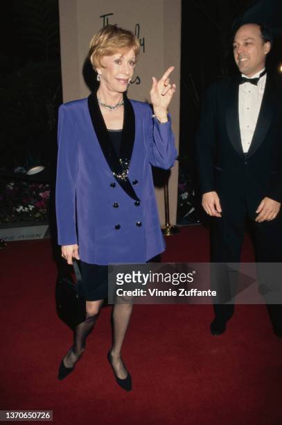 American comedian and actress Carol Burnett, wearing a blue-and-black suit, attends the Annual Costume Designers Guild Awards Gala, in Beverly Hills,...
