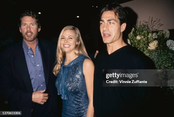 American actor and singer David Hasselhoff, American actress and television personality Brooke Burns, and American actor and model Michael Bergin at...