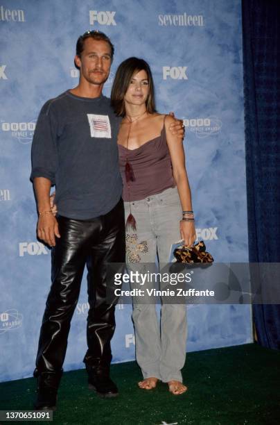 American actor Matthew McConaughey and American actress Sandra Bullock attend the inaugural Teen Choice Awards, held at the Barker Hangar at Santa...
