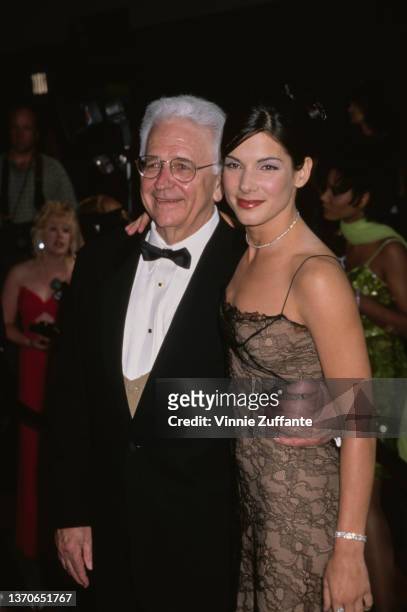 American voice coach John Wilson Bullock and his daughter, American actress Sandra Bullock attend the 22nd Annual People's Choice Awards, held at...