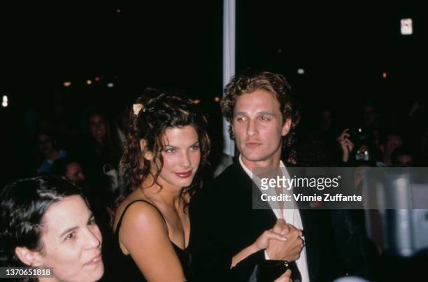 American actress Sandra Bullock and American actor Matthew McConaughey attend the Los Angeles premiere of 'In Love and War,' held at the DGA Theatre...