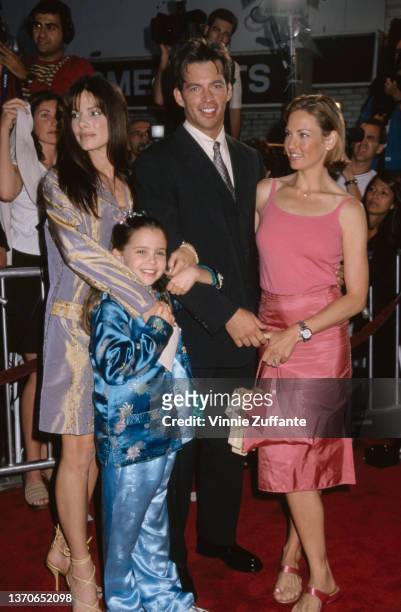 American actress Sandra Bullock, American actress Mae Whitman, American singer, actor and pianist Harry Connick Jr, and his wife, American actress...