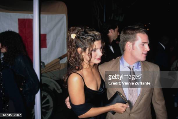 American actress Sandra Bullock and American actor Chris O'Donnell attend the Los Angeles premiere of 'In Love and War,' held at the DGA Theatre in...