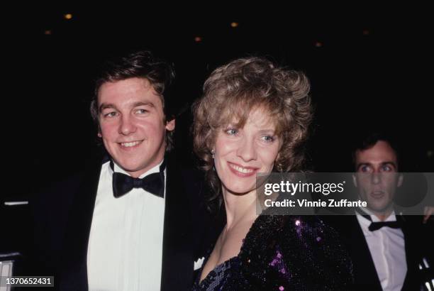 American actress Betty Buckley, accompanied by a man in a tuxedo, attends the 37th Annual Tony Awards, held at the Uris Theater in New York City, New...