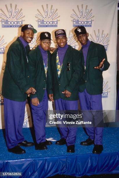 American R&B group Boyz II Men attend the 2nd Annual Billboard Music Awards, held at the Barker Hangar, Santa Monica Air Center in Santa Monica,...