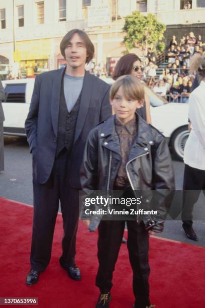 American singer-songwriter and musician Jackson Browne and his son, Ethan Browne, attend the Hollywood premiere of 'Batman Returns,' held at Mann's...