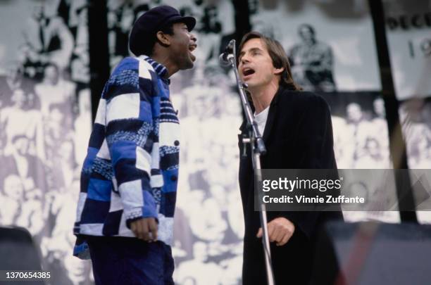 American singer-songwriter and musician Jackson Browne, Senegalese singer and songwriter Youssou N'Dour performing at the Nelson Mandela 70th...