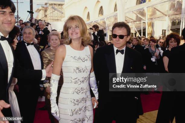 American actress Lorraine Bracco and her husband, American actor Harvey Keitel during 63rd Academy Awards, held at the Shrine Auditorium in Los...