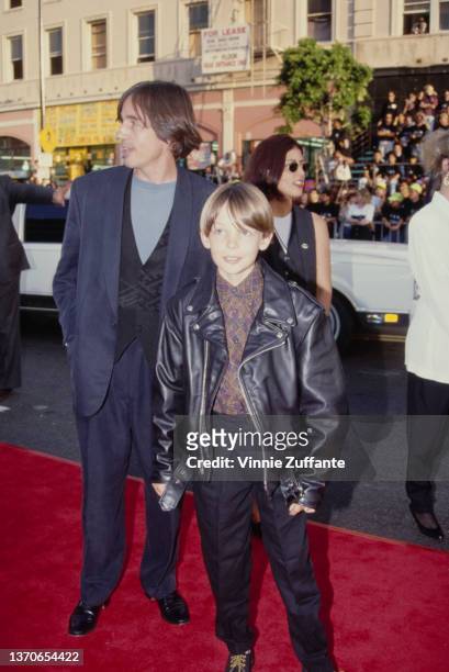 American singer-songwriter and musician Jackson Browne and his son, Ethan Browne, attend the Hollywood premiere of 'Batman Returns,' held at Mann's...
