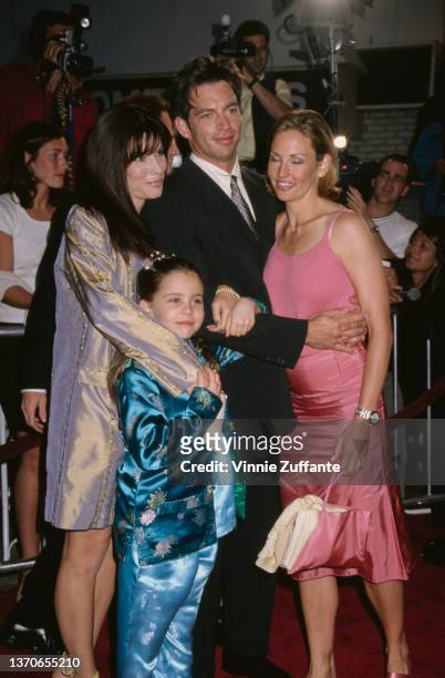 American actress Sandra Bullock, American actress Mae Whitman, American singer, actor and pianist Harry Connick Jr, and his wife, American actress...